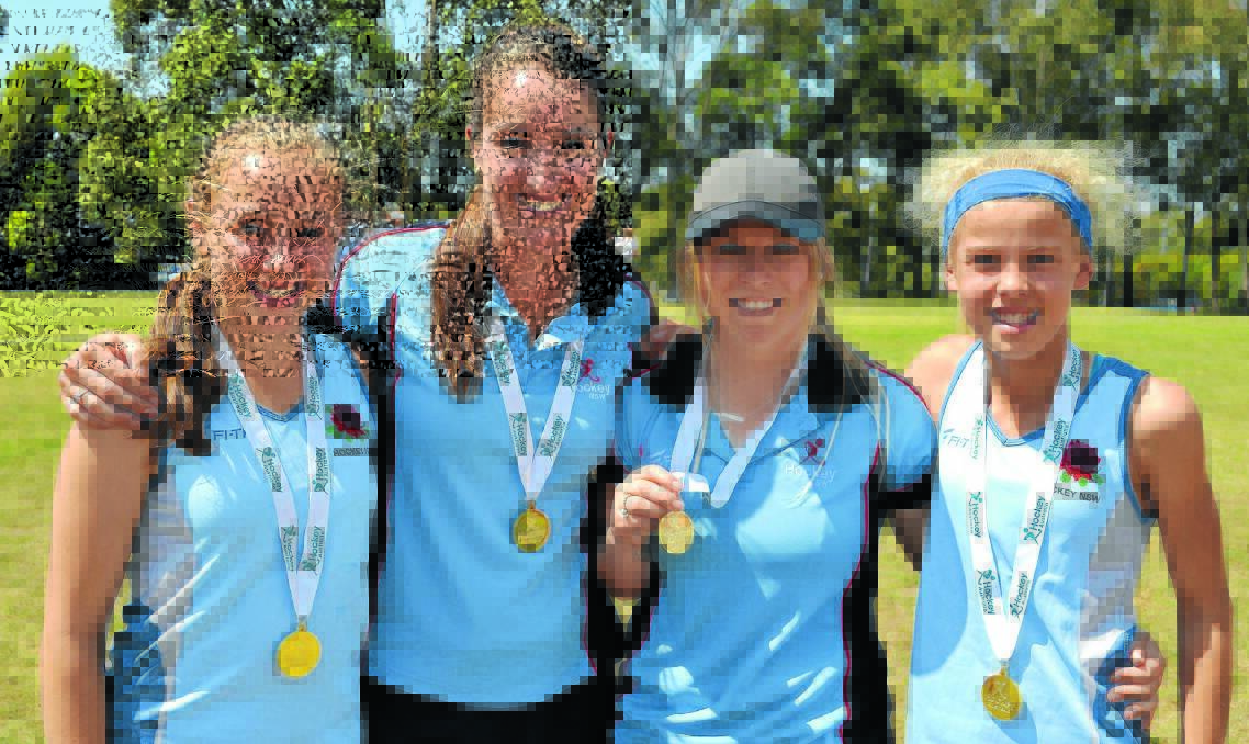 IN A STATE: Pip Mannix, Kate Pulbrook, Jade Warrender and Phoebe Litchfield are national hockey champions after NSW State claimed the 2015 Australian Hockey Championship in Sydney. Photo: CONTRIBUTED