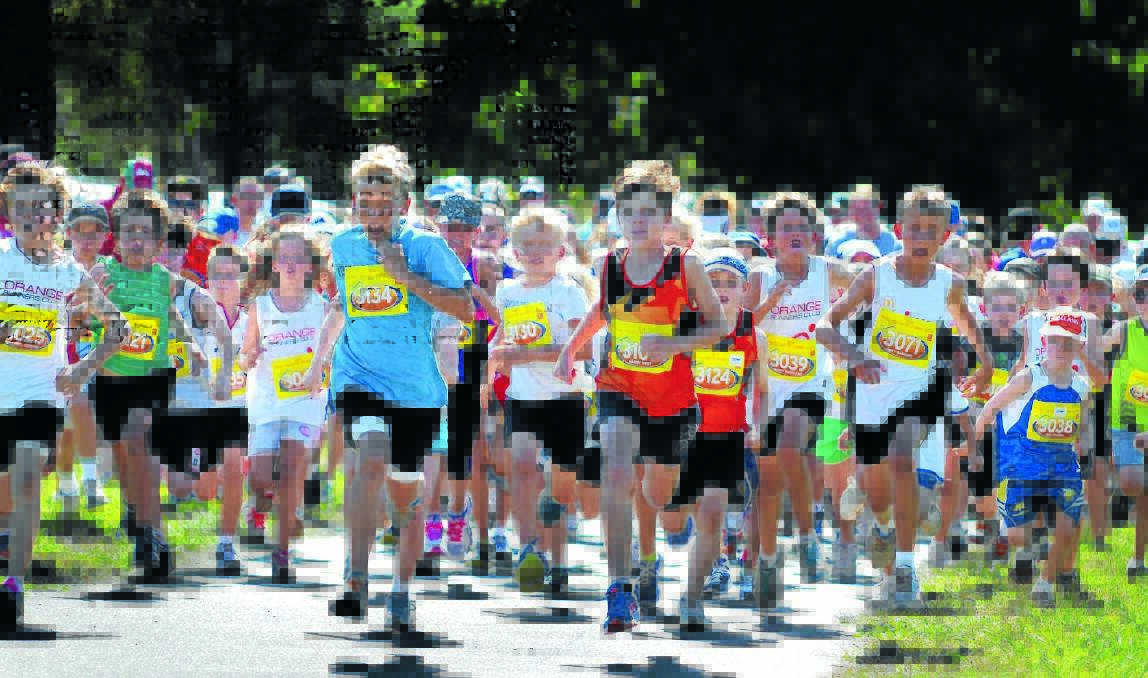 THEY’RE OFF: Eager beavers just after the start of the two kilometre junior dash on Saturday. 
Photo: STEVE GOSCH 0222sgrun1