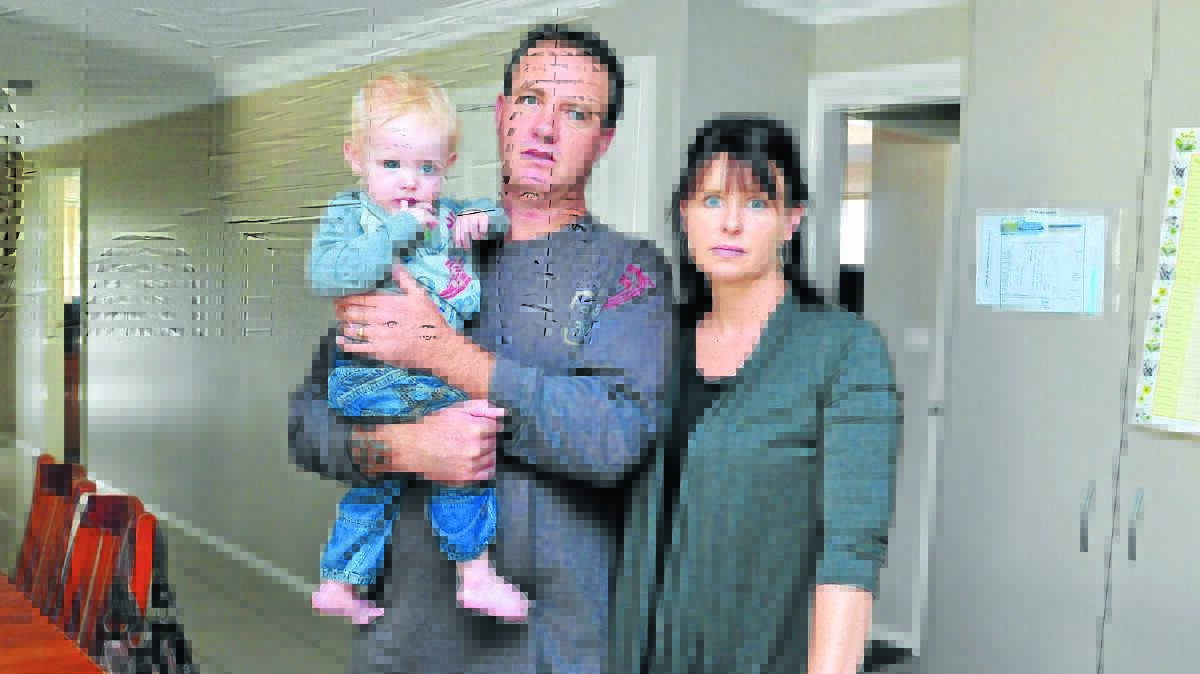 FAMILY TARGETED: Jen Sargent with her husband Brenden and son Brax says she no longer feels comfortable in her north Orange home after she was targeted by thieves. Photo: JUDE KEOGH 0407theft1
