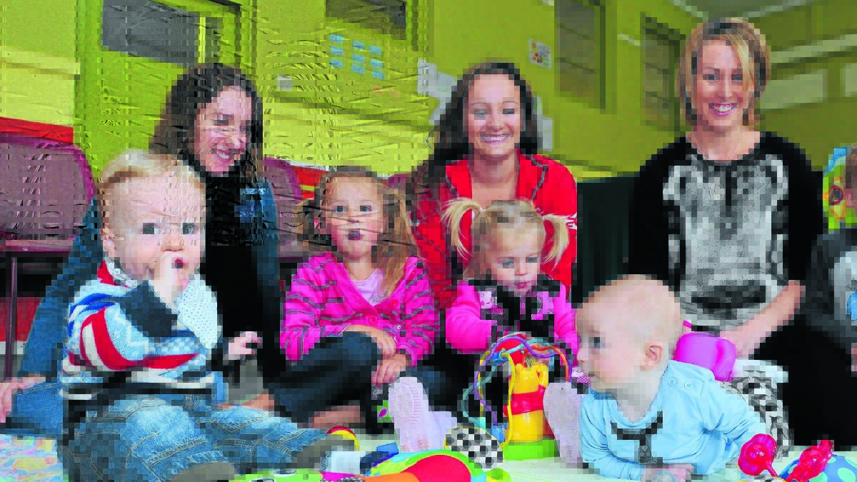 SUPPORT FOR PARENTS: Monica Hughes with her son Elijah, Kristy Armstrong with daughters Violett  and Indigo and Carrie Cox with baby Tully are looking forward to a visit by baby and toddler expert Pinky McKay at the weekend. Photo: JUDE KEOGH                       0430babysleep21
