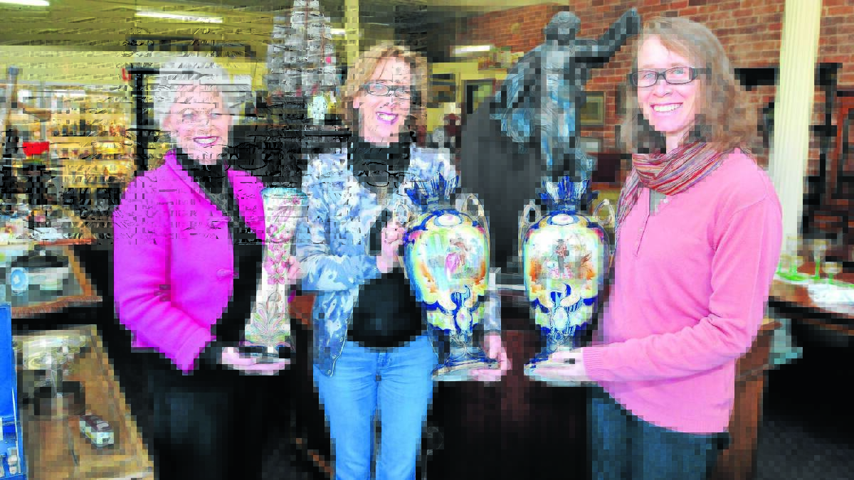 A GEM: Antiques, jewellery and vintage have all been incorporated into the new name for Zonta’s antique fair this weekend. Karen Blacklow, Frances Young, and Melissa Morgan show off some of the exquisite pieces which will be on show. Photo: JUDE KEOGH                                                                                                                                                                      0609antique4
