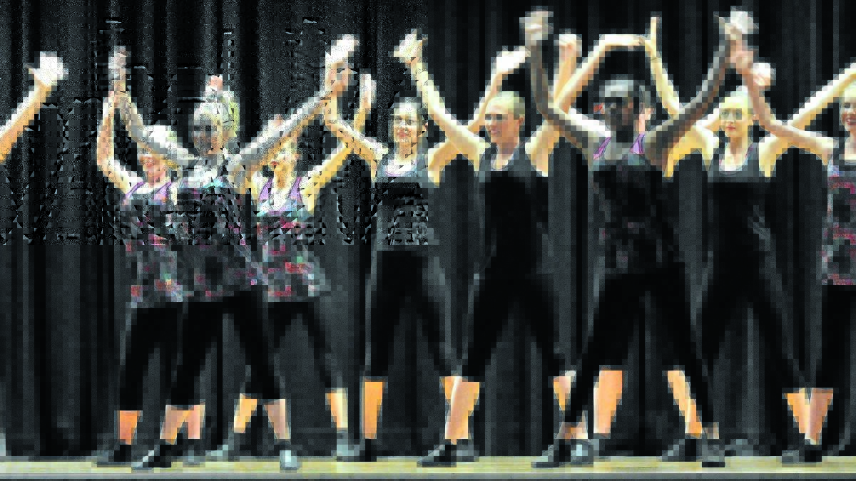 GETTING GROOVY: Year 9 sport group performing during the Canobolas High School Dance Spectacular one of the 18 events as part of the Youth Arts Festival. Photo: STEVE GOSCH  