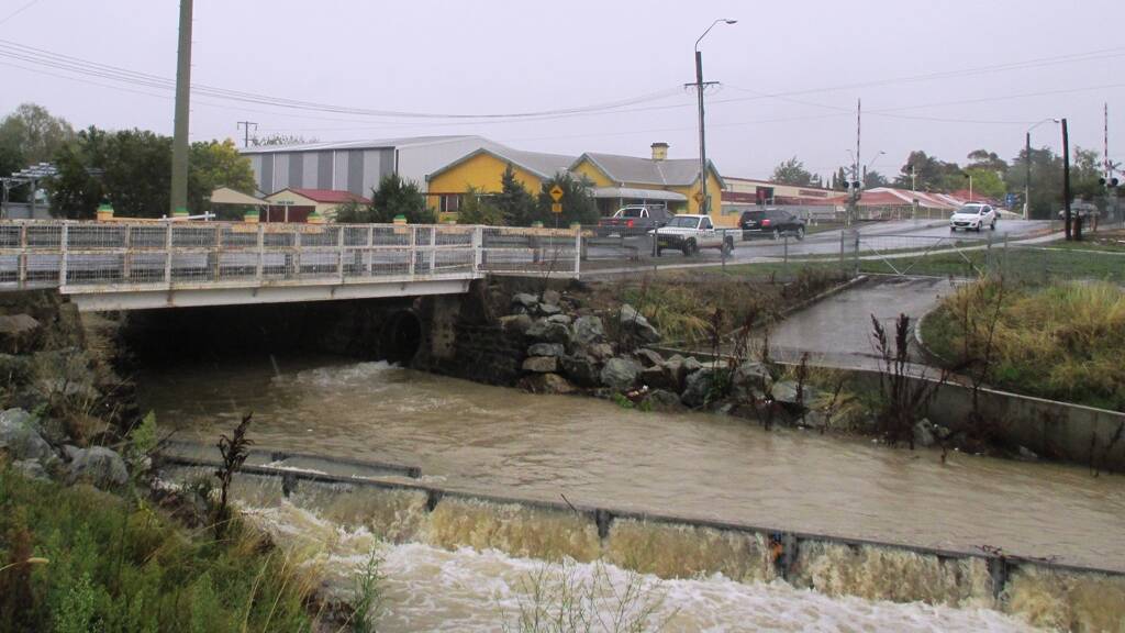 FULL STREAM AHEAD: Stormwater in Blackmans Swamp Creek at the Dalton street gross pollutant trap, March 1, 2014
