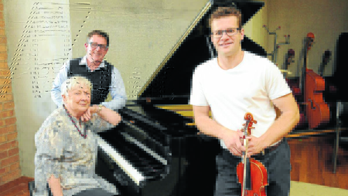 PULL UP A PEW: Meriel Owen, vicar Ben Edwards and Andrew Baker will perform at Molong’s St John’s Anglican Church tomorrow afternoon. Photo: STEVE GOSCH 1119sgmolong1
