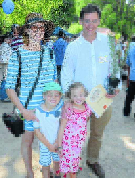 PROUD TO BE AN AUSSIE: Celia and Richard Baxter with twins Max and Abi who were proud of their dad for choosing to become an Australian citizen on Tuesday. Photo: JUDE KEOGH 
