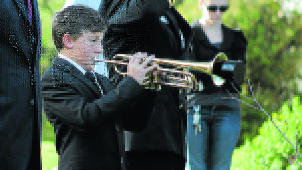 DIDN’T MISS A BEAT: Thirteen-year-old Orange schoolboy Lachlan Cisco had the honour of playing reveille and the last post yesterday. 
 Photo: STEVE GOSCH 0425sgpilgrimage4
