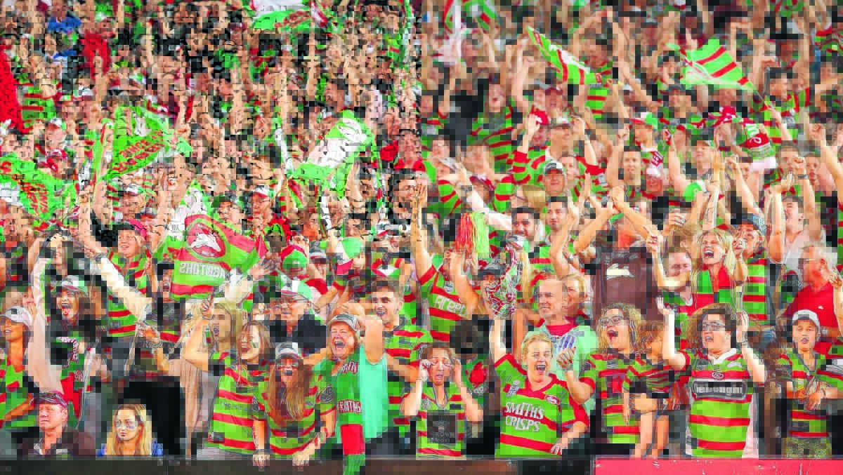 RED AND GREEN MACHINE: The South Sydney Rabbitohs fans make no effort to hide their delight after their side's NRL grand final win over Canterbury Bankstown Bulldogs at ANZ Stadium on Sunday night. Photo: GETTY IMAGES