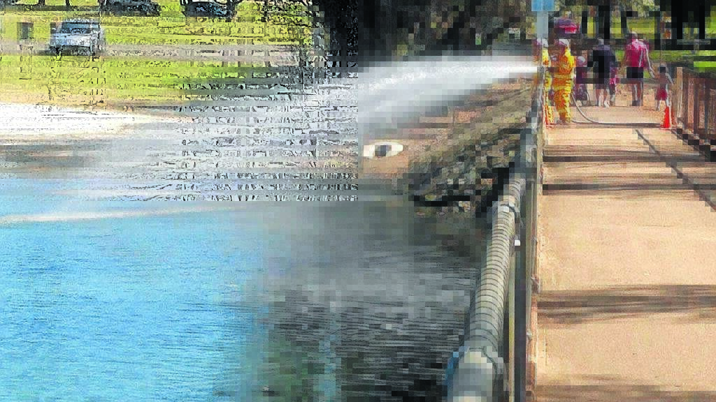 GETTING PREPARED: Canobolas Zone rural firefighters pumped water in and out of lake Canobolas as part of a training day on Sunday to prepare for the upcoming fire season. Photo supplied