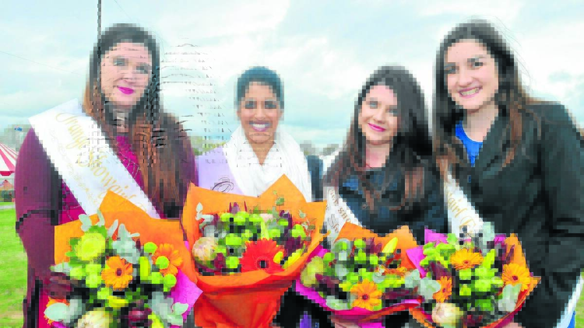 BOUQUETS TO CONTESTANTS: Tess Crossley, Mel Gooneratne (winner), Samantha Theobald (runner-up) and Carly Franks say they enjoyed competing in this year’s Orange Showgirl competition. 
Photo: LUKE SCHUYLER 0510lsshowgirls7
