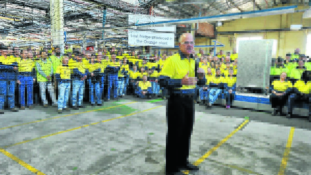 SAD FAREWELL: Electrolux general manager Mark O’Kane addresses staff after the last fridge rolled off the line on Monday.  