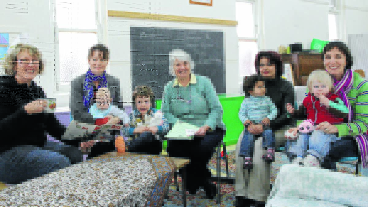 PARENTING COURSE: Nancy Nash, Alison Doyle holding Lucas Davies, Curtis Davies, Bev Rankin, Atefeh Hajiaghi holding Ana Hajiaghi, Cassie Uphill-Buckland holding Matilda Buckland are all taking part in the Fusion parenting course.  0730MFCHURCH