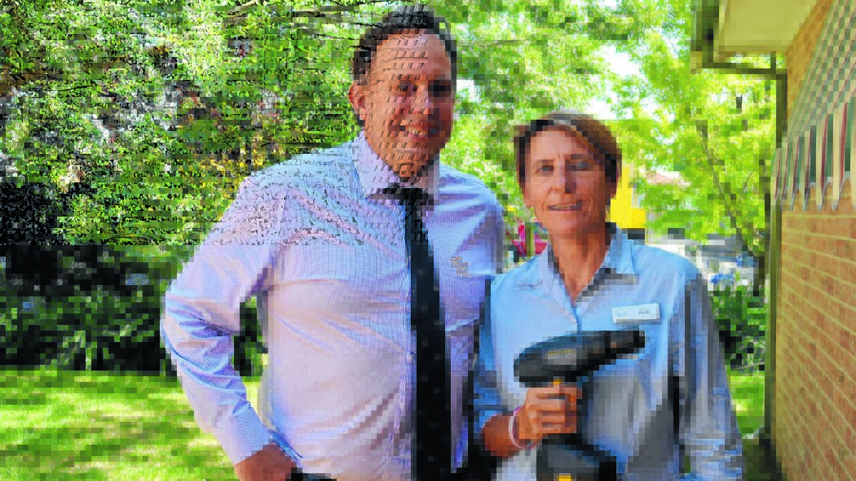 TRICKS OF THE TRADE: Orange City Council director of community recreation and cultural services Scott Maunder and council choices at home support worker Paula Beattie are looking forward to setting up the new women’s shed in Orange. 
Photo: TANYA MARSCHKE 0211tmwomen1.

