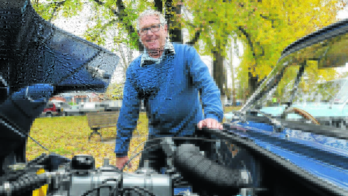 Orange classic car owners show off their vehicles