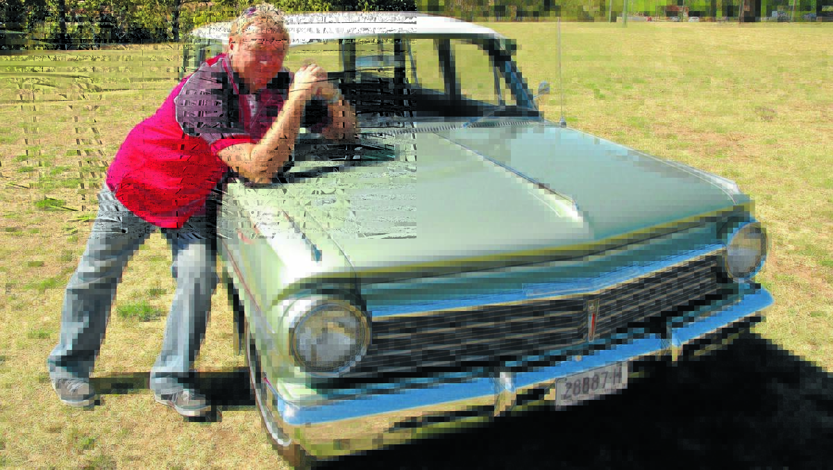 OLDIE BUT A GOODIE: Gnoo Blas Classic Car Club member Col Pollack plans to take his Holden for a drive on Sunday to celebrate National Motoring Heritage Day. 
Photo: DENIS GREGORY colsholden
