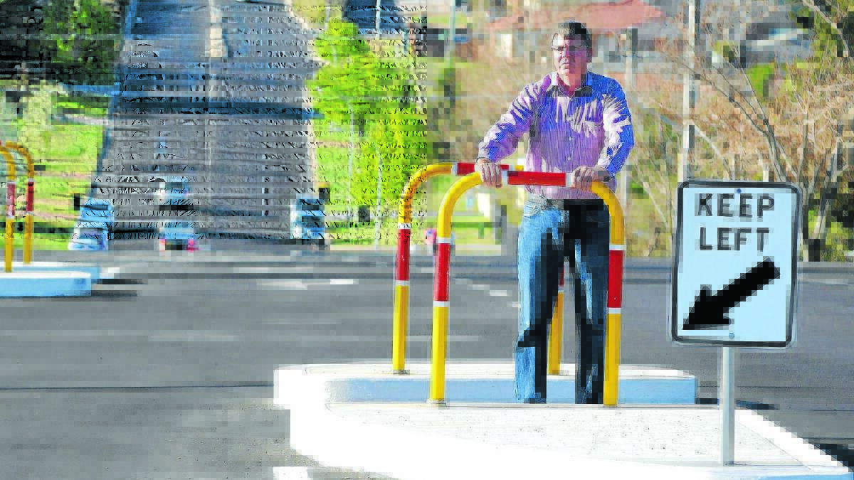 SEAL OF APPROVAL: Councillor Glenn Taylor praised the use of hot mix asphalt on Hill Street and believes the program should be expanded. Photo: JUDE KEOGH 