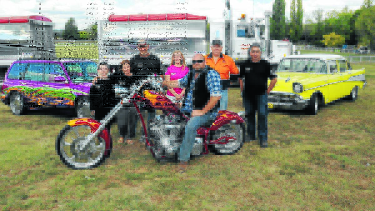 ON SHOW: Alec Mills, Tracey Harris, Peter Mills, Mitzi Cronk, Mick Hevers, George Georgiou and Ross Harvey are looking forward to the 10th Orange swap meet, which will be accompanied by a car, bike and truck show on Sunday. Photo: JUDE KEOGH                                                                                        0318carshow1
