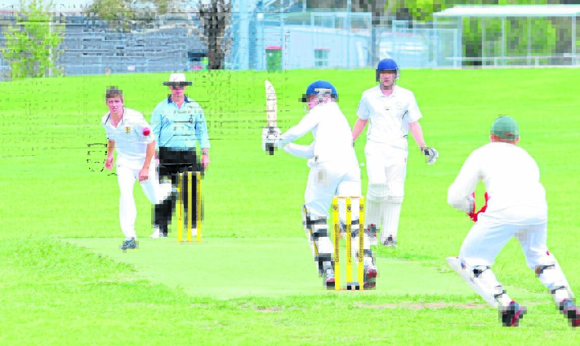 FOUR MORE: Orange bat Max Dodds hits Bathurst bowler Jeremy Judge to the boundary in his side’s big MCC colts preliminary final win yesterday. Photo: JUDE KEOGH                                             0302cricket3
