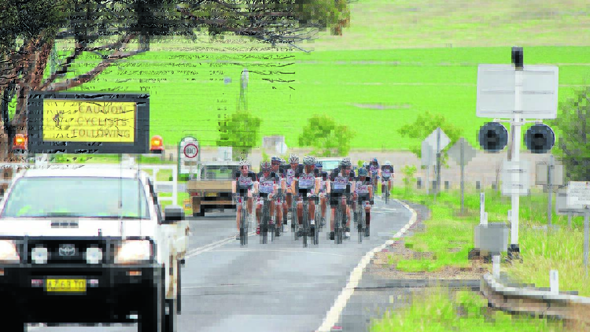 TOUR DE MANILDRA: A support vehicle drives ahead of cyclists in the Mill2Mill charity bike ride. Photo: contributed.