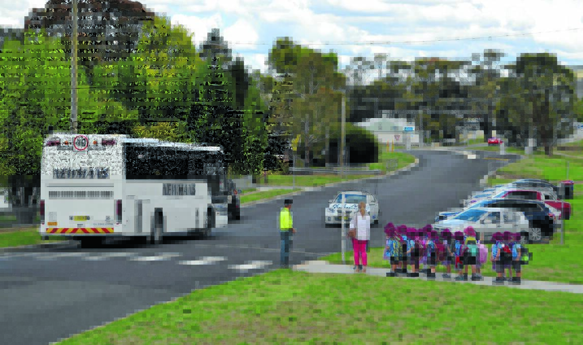 WELL ORGANISED: Parents of children at St Joseph’s Catholic School say children saw their evacuation on Thursday as a big adventure. Photo: Bryant Hevesi
