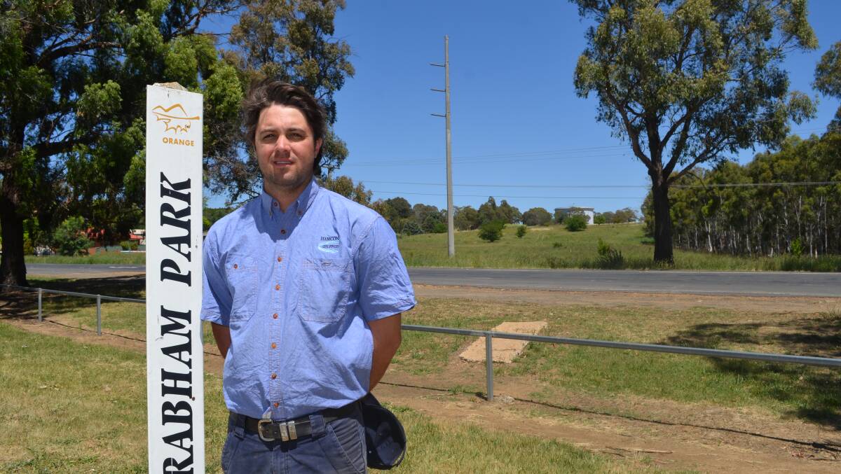 HOMEMADE: Hamcon Civil operations manager Nathan Wood at the nothern end of Jack Brabham Park, which will become part of the new intersection of Forest and Huntley roads as part of the Southern Feeder Road. Photo: DANIELLE CETINSKI 1121dcfeeder5