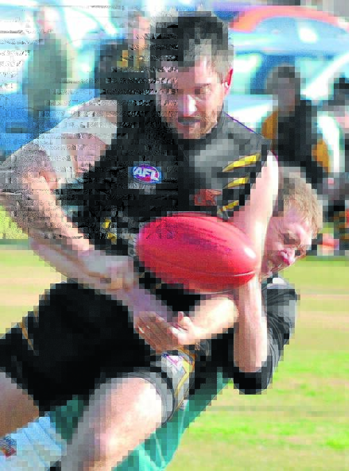 LEAVING A MARK: Daniel Sadler playing for the Tigers in the Central West AFL competition