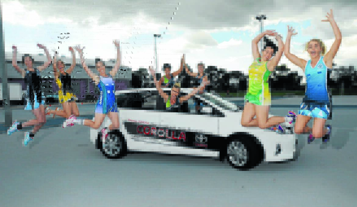 WHAT A FEELING: Division one players (from left) Rhiannah McIntyre, Sophie Kloosterman, Tegan Dray, Petrina Allen, Mardi Aplin (front), Amanda Hurford, Katie Matthews and Nikki Collins are looking forward to the 2014 Orange Toyota Cup season. 
Photo: STEVE GOSCH 0331sgnet2