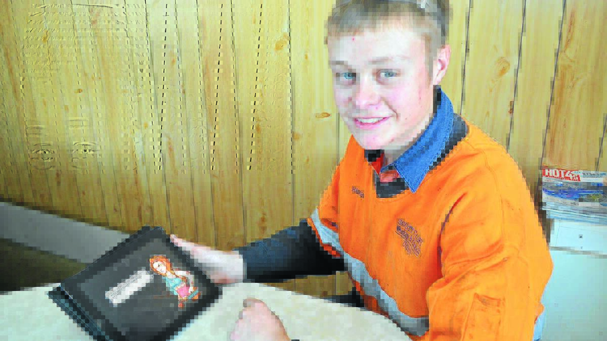 SAVING THE WORLD: Scott Camery Welding and Fabrication apprentice Hayden Robinson is participating in Skillset PowerPlay to reduce his energy consumption at home. 
Photo: DANIELLE CETINSKI 