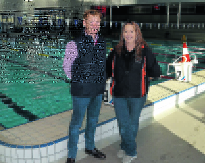 LANE CHANGE: Jets swimming coach Michael Thornhill and Tania Chapman from City of Orange Swimming Club have been working together along with Orange City Council to ensure all parties are accommodated at the Orange Aquatic Centre during winter. Photo: BRYSON FERREIRA. 
