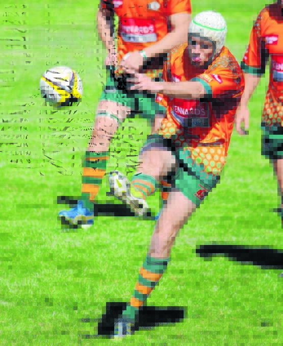 HIGH FIVE: Orange City winger Barton Young, pictured playing in last year's second grade grand final, scored five tries in the Lions' major semi-final win over Dubbo last weekend.