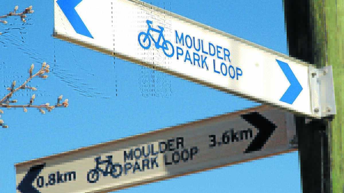 IN THE LOOP: One of the new bike friendly street signs.
