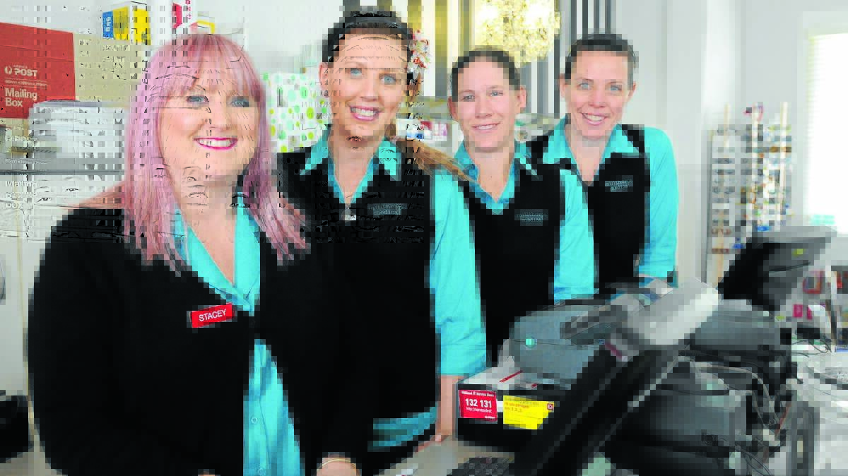ON THE BALL: Millthorpe Post Office and Pharmacy employees Stacey Lochrin, Jade Jones, Linda Krogh and Helen Foran have saved several people who were caught in an online scam. Photo: STEVE GOSCH 0926sgscam1