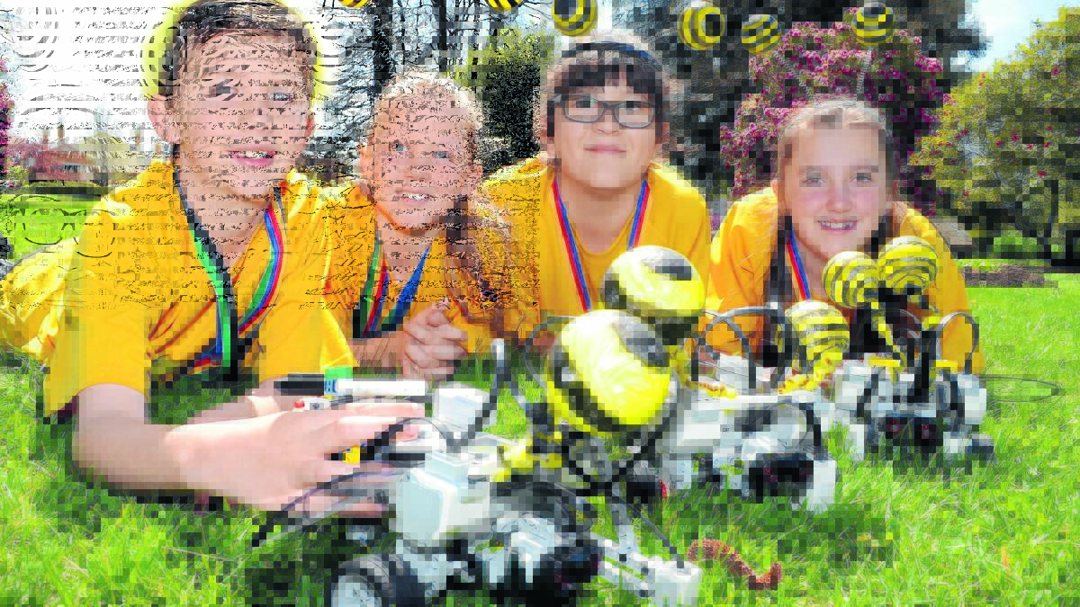 AUSTRALIAN CHAMPIONS: Mullion Creek Public School students Hugh Sheardown, Tyarna Pavy, Briana McLuckie and Caitlyn White were very successful at the  RoboCup Junior Australian Open Championships in Adelaide. Photo: JUDE KEOGH					  	              
