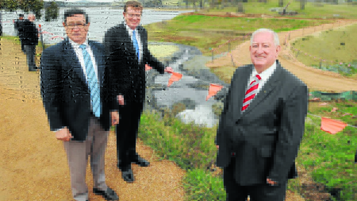 GO WITH THE FLOW: Member for Calare John Cobb, member for Orange Andrew Gee and mayor John Davis at the completed Macquarie pipeline.  Photo: JUDE KEOGH                                  