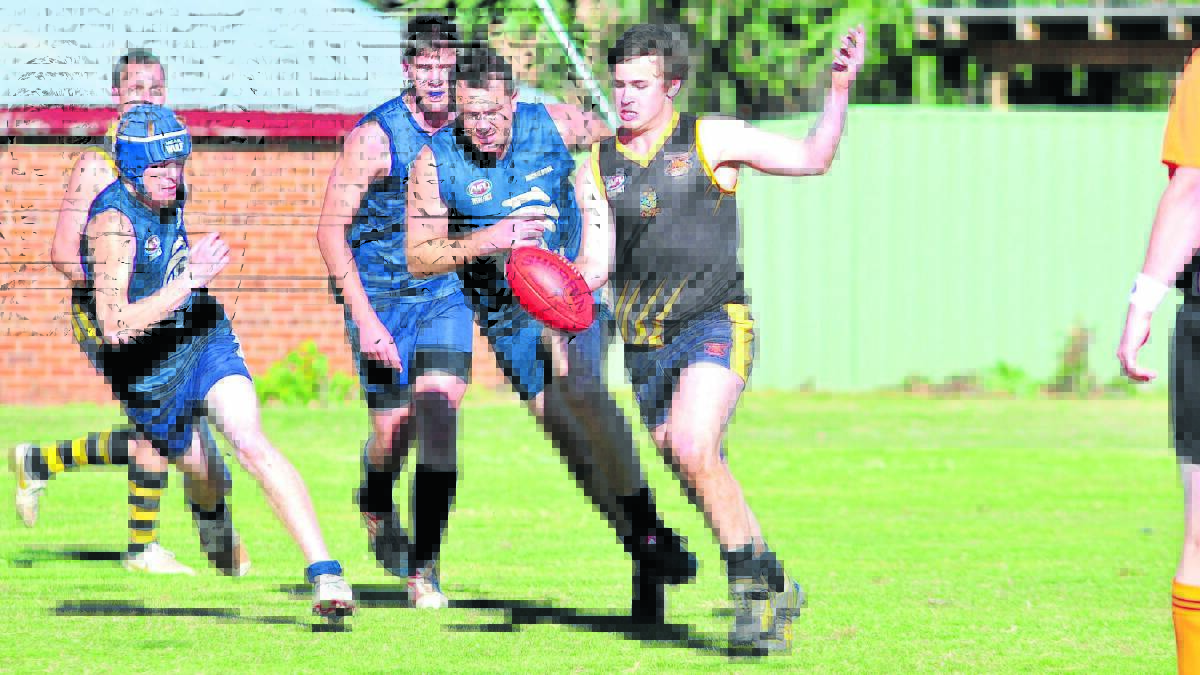 NOTABLE OMISSION: Tigers' star midfielder Michael Rothnie will miss today's clash with Dubbo. Photo: JUDE KEOGH 0817afl3