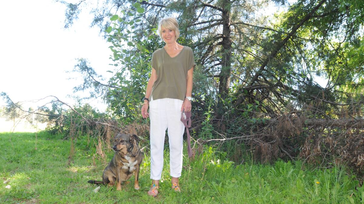 NOT TAKING THE BAIT: Anne Reith and her dog, Sarah, at Machin Park where bait was found last year.
Photo: JUDE KEOGH   