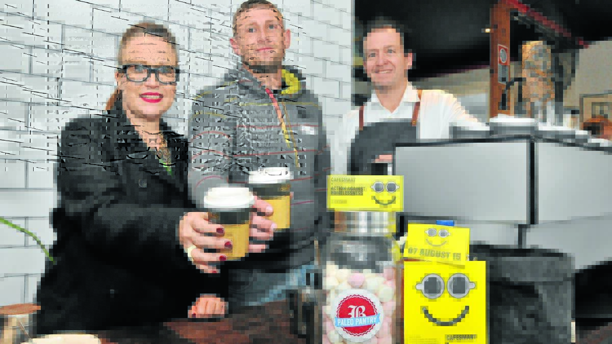 HELPING HOMELESS: StreetSmart’s Lindy Thompson, with Veritas House case worker Scott Hanrahan and Byng Street Cafe owner Jeremy Norris who are raising money for homeless people in Orange. Photo: JUDE KEOGH. 
