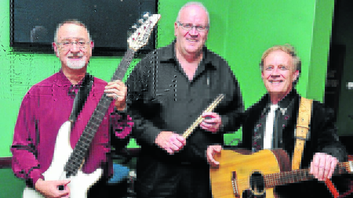 THE BAND PLAYED ON: Cedric Inman, Darrell Hair and Neil Birdsall at a reunion gig in Orange on Sunday at the Victoria Hotel.