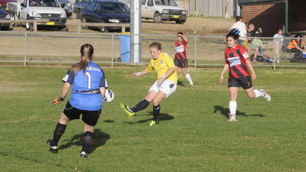 ON THE BOARD: Megan Embleton was one of the leading scorers for Western NSW last year, and on Sunday she scored the Mariners’ first goal of season 2014. Photo: CHRIS SEABROOK 051213cwsoc2