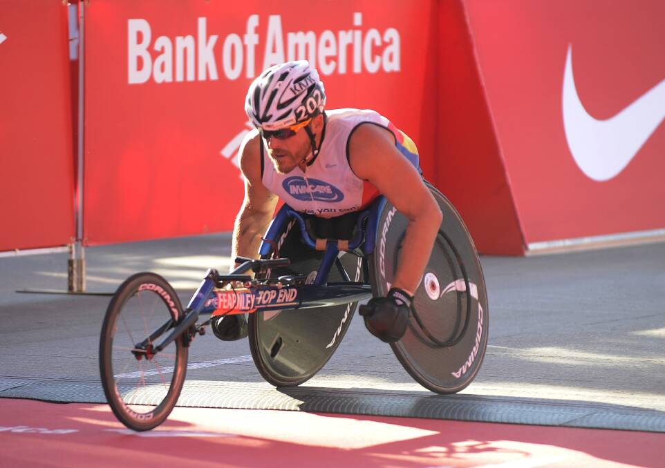 TAKE FIVE: Carcoar’s Kurt Fearnley picked up his fifth Chicago Marathon win, and first since 2011, after breaking away in the final 200 metres. Photo: GETTY IMAGES 101215fearnley