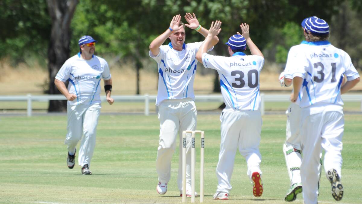 LITTLE VICTORY: Curtis Free celebrates the only wicket Orange took during their SCG Country Cup loss to Dubbo yesterday. Photo: CHERYL BURKE