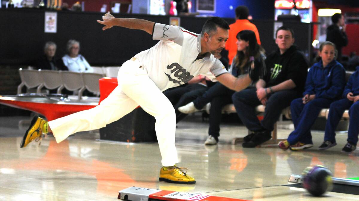 ON THE LINE: Queensland's George Frilingos show off his action during Friday night's XGames Bowling exhibition match. Photo: STEVE GOSCH 0502sgtenpin11