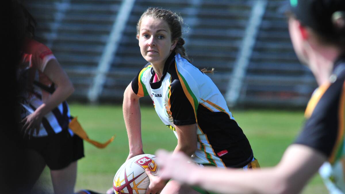 LIFT: Orange CYMS star Tori Moore said her side needs to perform better to have a hope in the 2014 finals series. Photo: JUDE KEOGH 0811leaguetag6
