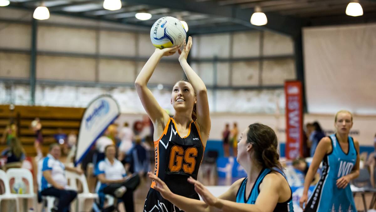SHOT TO THE TOP: Orange shooter Danielle Turner has helped Orange claim this year's Netball NSW State Championship open title. Photo: SMP Images.