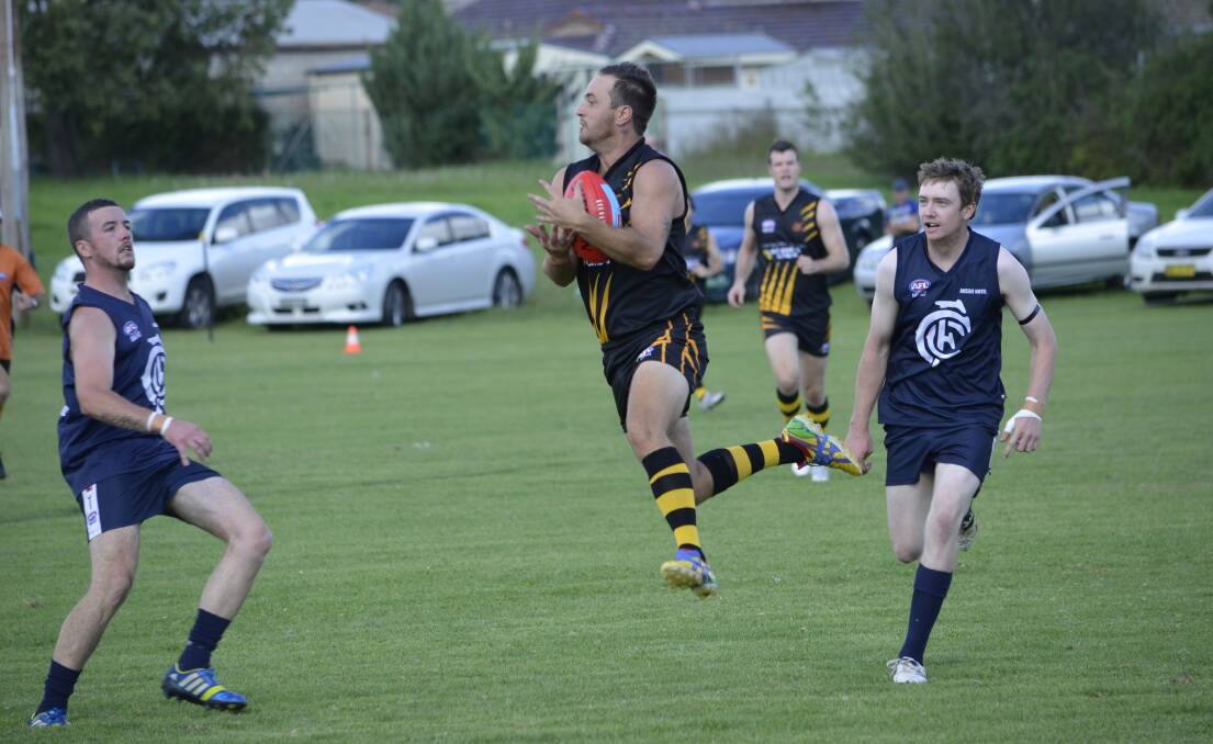ON THE FLY: Orange Tigers gun Paul Jenkins in action for the black and golds in Cowra. Photo: DAMIEN JOHNSON
