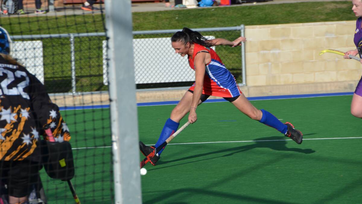 FULL OF RUNNING: Annette Pakinga charges after the ball during Confederates' women's Premier League Hockey match against Lithgow Panthers. Photo: JEFF GEDDES