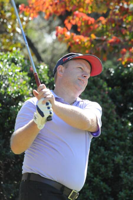ON THE MONEY: David Chippendale plays his shot on the way to winning his Orange Ex-Services Country Club A grade match play semi-final on Sunday. Photo: JUDE KEOGH 0427countrygolf1
