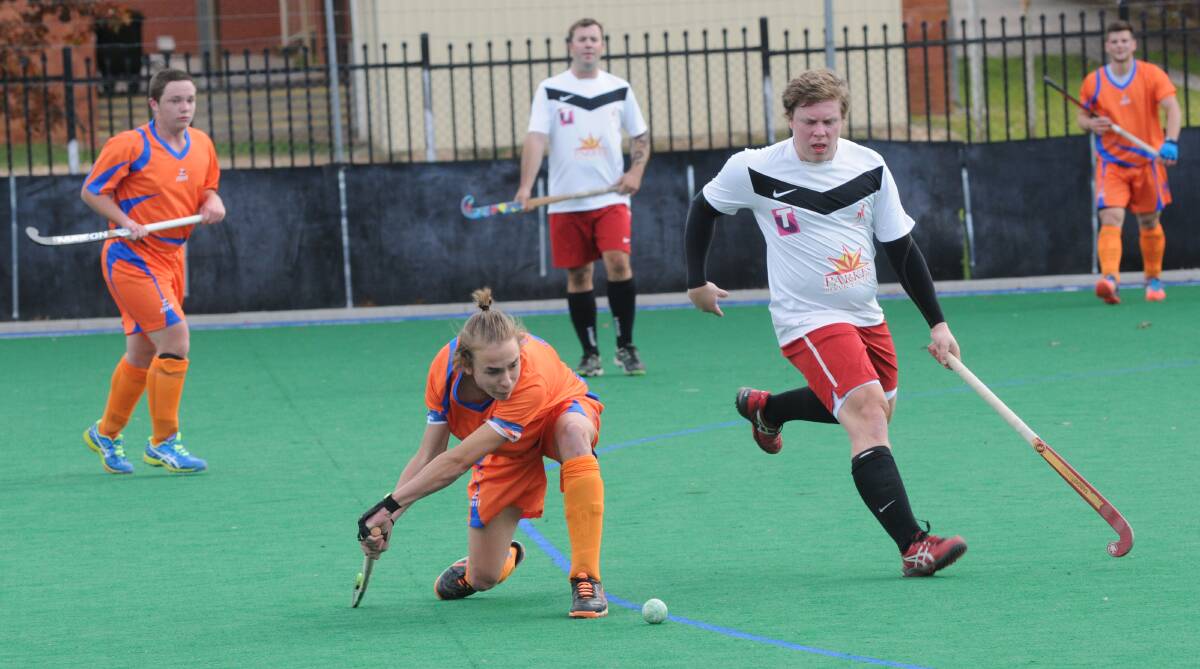 LOW BLOW: Hayden Dillon scored for Wanderers in their season-opening win. Photo: MARK LOGAN 0509mlhockey1