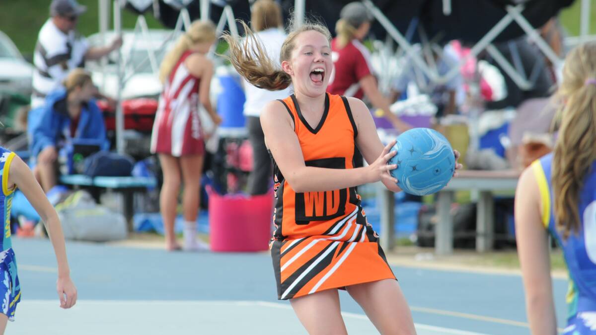 POWER PLAYER: Maddie Cole enjoyed representing Orange in annual carnival on Sunday. Photo: JUDE KEOGH 0427netball10