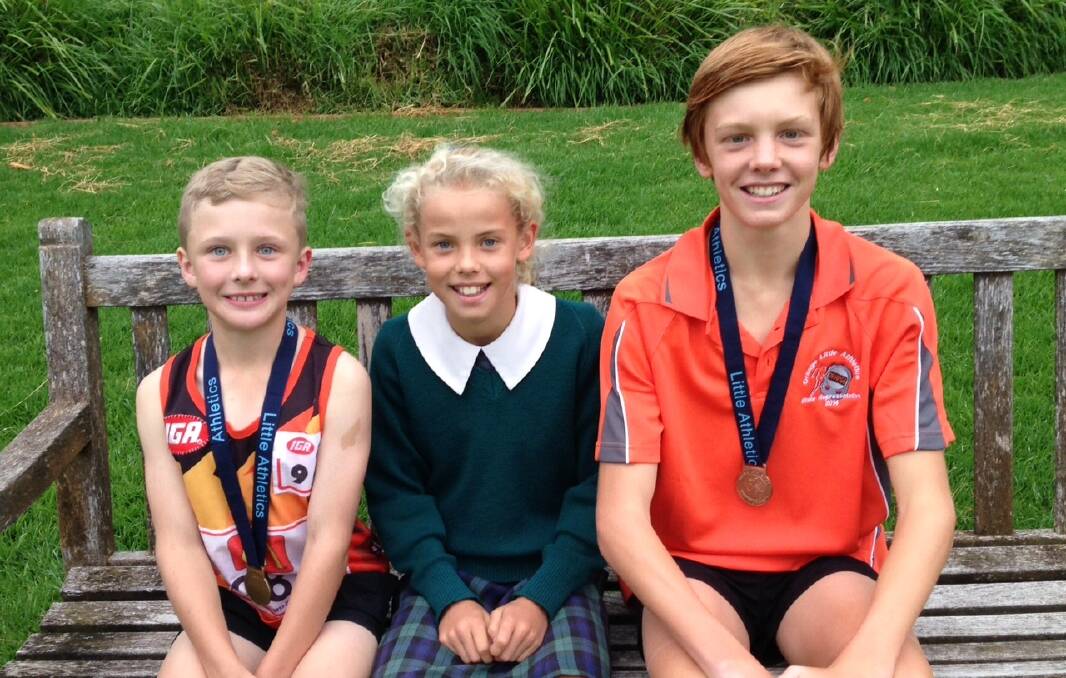 MEDALS: Stirling Farr, Phoebe Litchfield and Connor Whiteley earned medals at the Little Athletics Track and Field State Championships last weekend. 