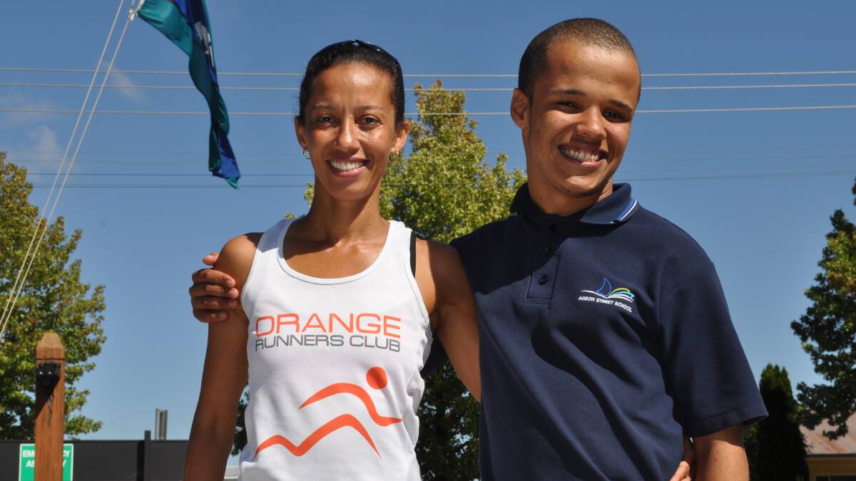 FAMILY FUN: Ursula Wilson and her son Keagan will run in today's two kilometre dash, with Ursula to then run in tomorrow's marathon. Photo: NICK McGRATH 0227nmmarathon1